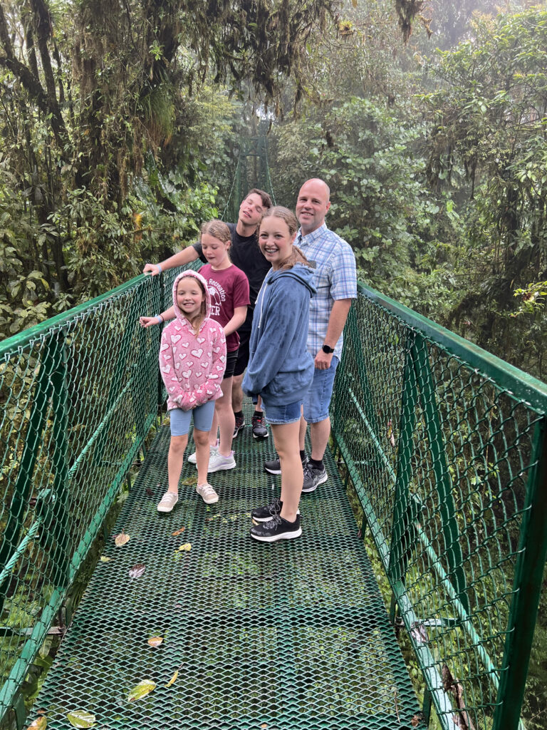 family on hanging bridges at selvatura park monteverde